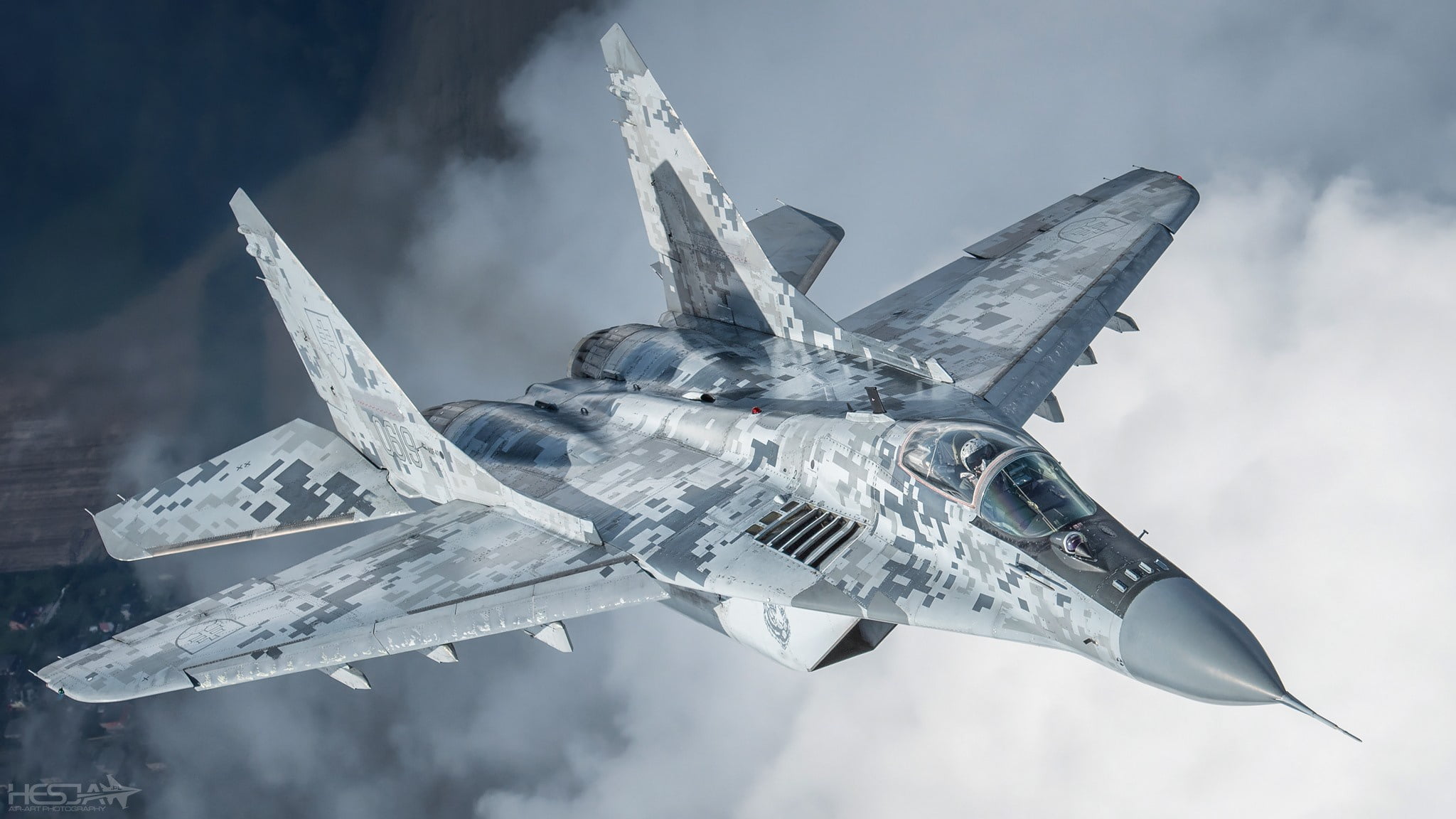 Fixed-wing fighter aircraft in flight