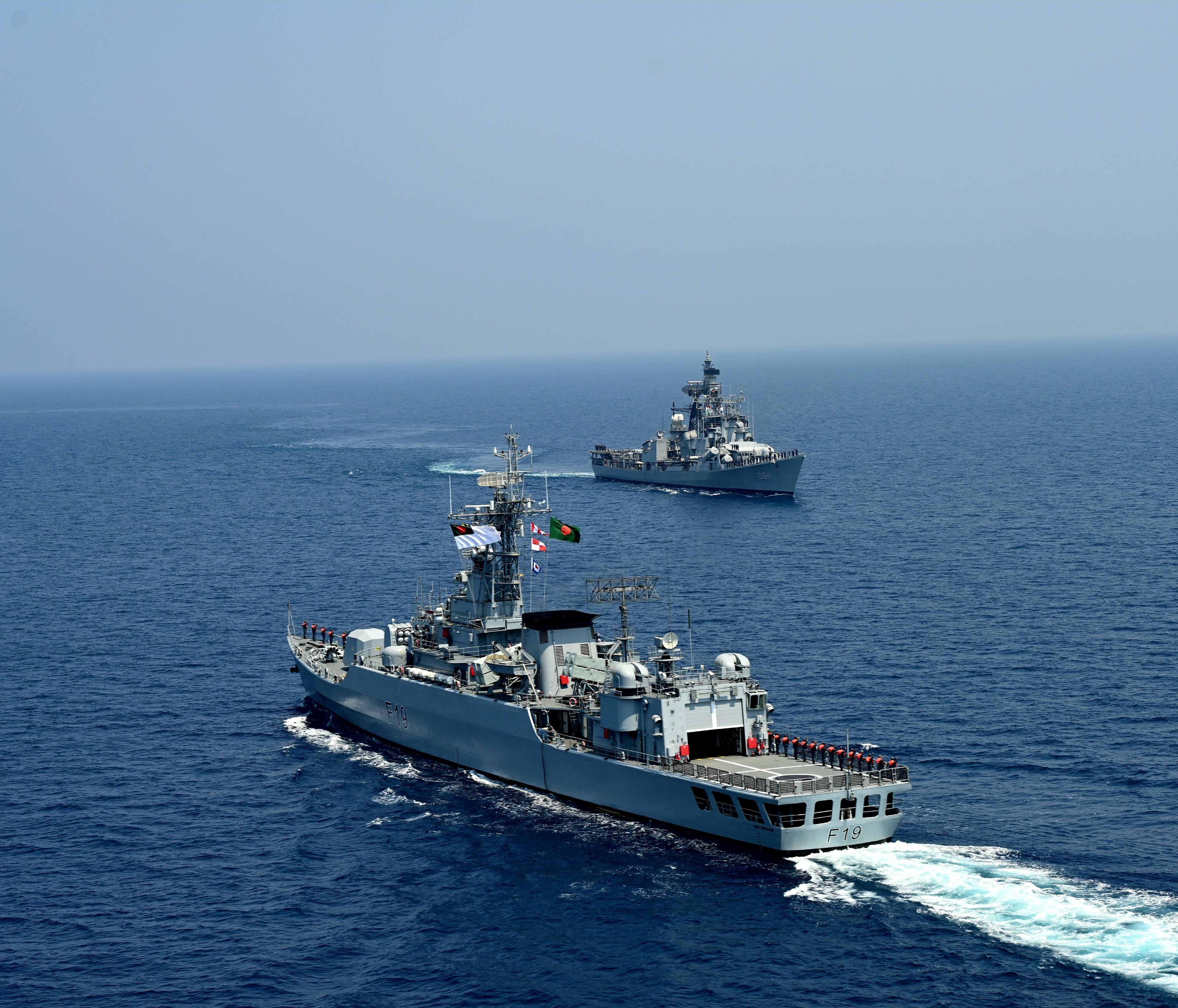 Bangladesh Navy frigate underway alongside an allied vessel